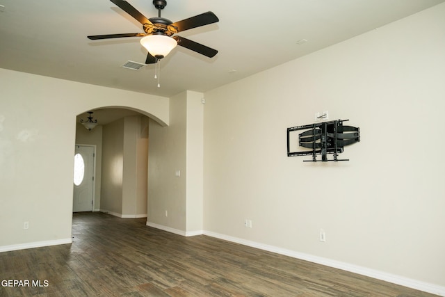 756 Jalynn Grace, Canutillo, TX 79835 - unfurnished room with arched walkways, wood finished floors, and a ceiling fan
