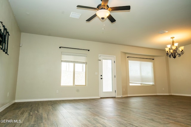 756 Jalynn Grace, Canutillo, TX 79835 - empty room featuring a chandelier, wood finished floors, and a ceiling fan