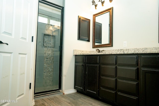 756 Jalynn Grace, Canutillo, TX 79835 - bathroom with a shower stall, wood finished floors, and vanity