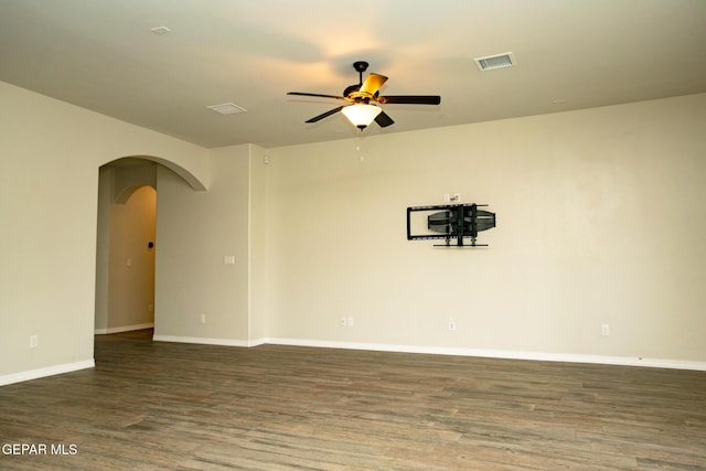 756 Jalynn Grace, Canutillo, TX 79835 - unfurnished room featuring arched walkways, a ceiling fan, and wood finished floors