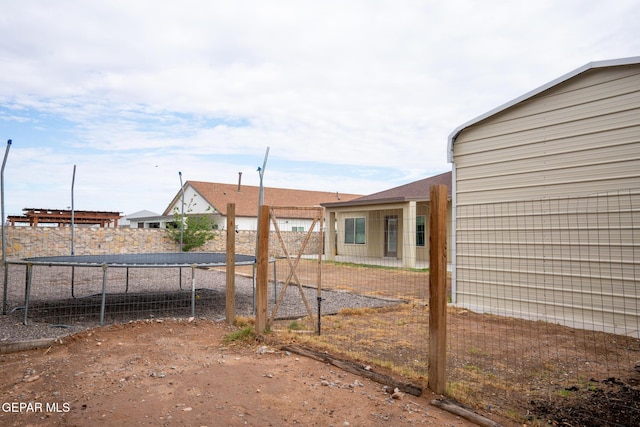756 Jalynn Grace, Canutillo, TX 79835 - view of yard featuring a trampoline