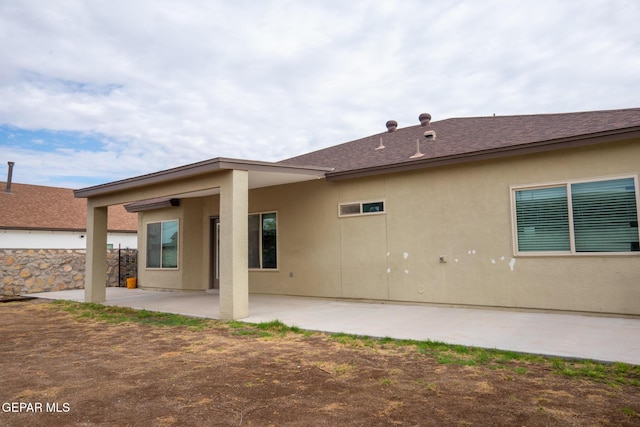756 Jalynn Grace, Canutillo, TX 79835 - back of property featuring a patio, stucco siding, and roof with shingles