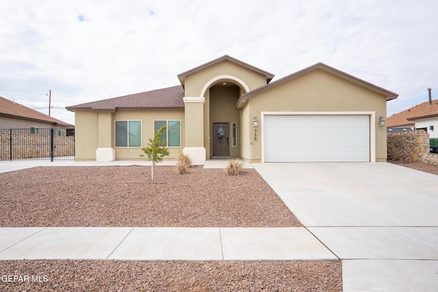 756 Jalynn Grace, Canutillo, TX 79835 - view of front of home with stucco siding, a garage, and concrete driveway