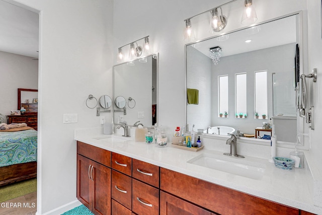 bathroom featuring connected bathroom, a soaking tub, a sink, and double vanity