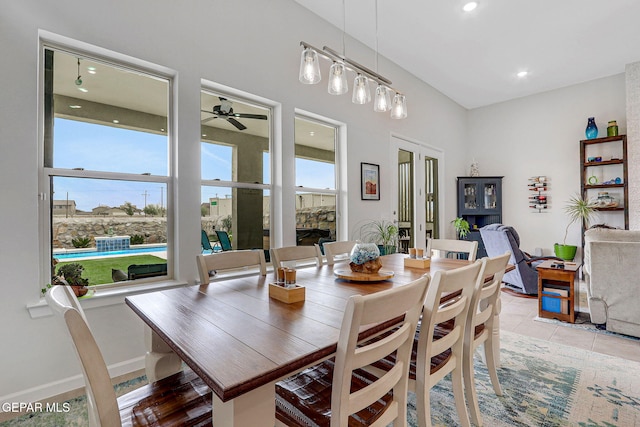 dining space with recessed lighting, light tile patterned flooring, baseboards, and ceiling fan