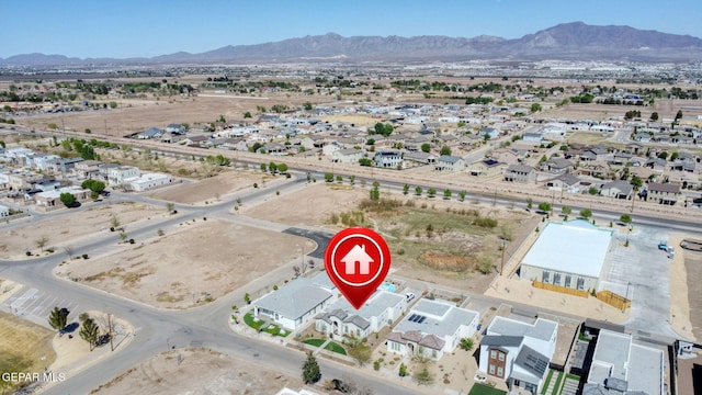 birds eye view of property featuring a residential view and a mountain view