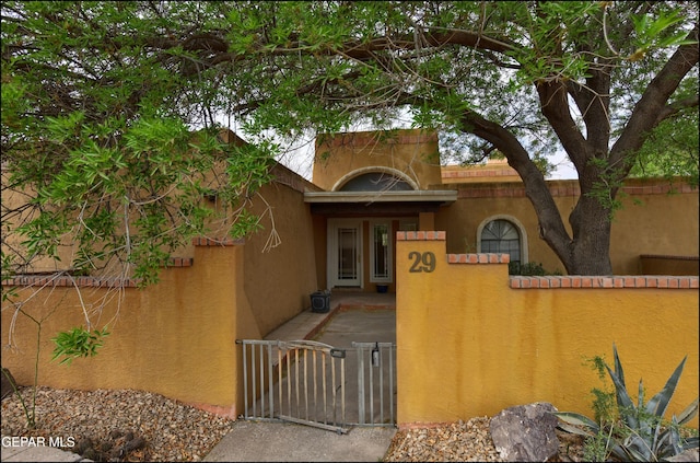 29 Cielo Vis, Anthony, NM 88021 - exterior space with stucco siding, a gate, and fence