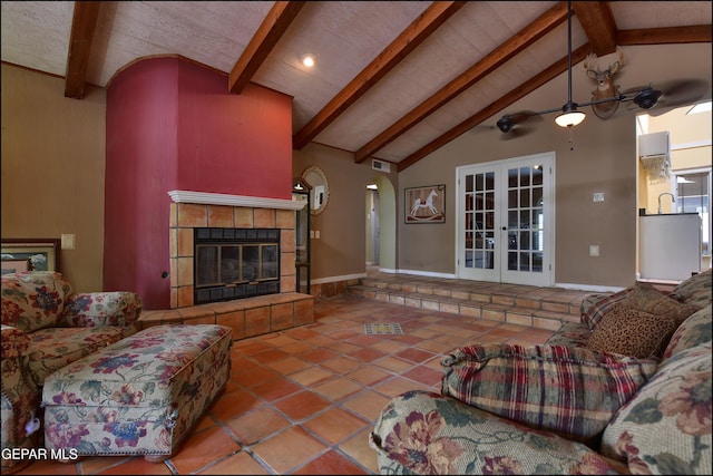 29 Cielo Vis, Anthony, NM 88021 - living room featuring tile patterned floors, french doors, lofted ceiling with beams, visible vents, and arched walkways