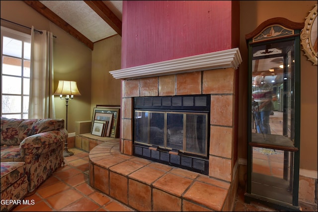 29 Cielo Vis, Anthony, NM 88021 - living area with lofted ceiling with beams and a tiled fireplace