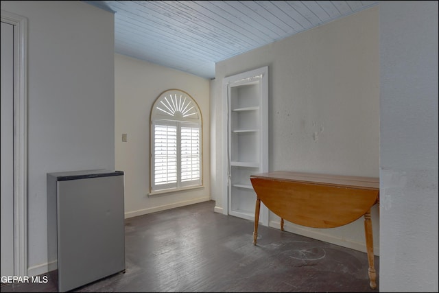 29 Cielo Vis, Anthony, NM 88021 - office featuring baseboards, built in shelves, wood ceiling, and wood finished floors