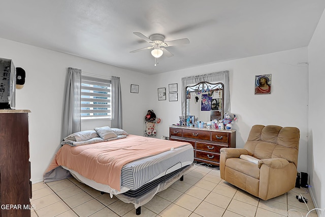 bedroom with light tile patterned flooring and ceiling fan