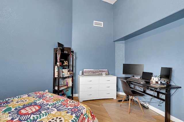 7101 Luz De Sol Dr, El Paso, TX 79912 - bedroom featuring visible vents, baseboards, and light wood-style flooring