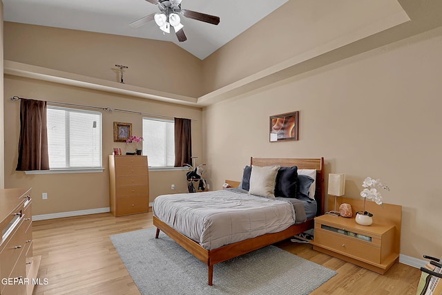 7101 Luz De Sol Dr, El Paso, TX 79912 - bedroom featuring light wood-style flooring, ceiling fan, baseboards, and lofted ceiling