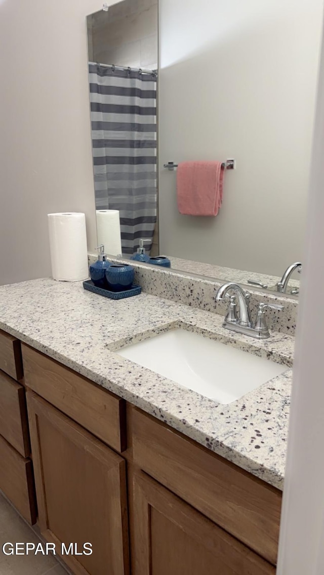 14509 Johnny Mata Dr, El Paso, TX 79938 - full bathroom featuring vanity and a shower with curtain