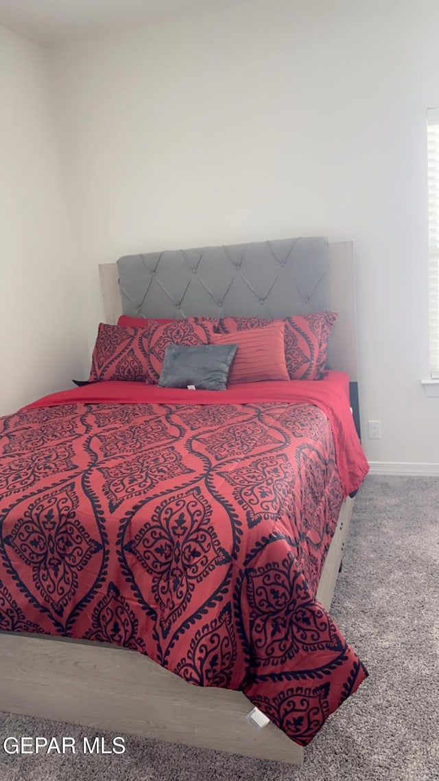 14509 Johnny Mata Dr, El Paso, TX 79938 - bedroom featuring carpet floors and baseboards