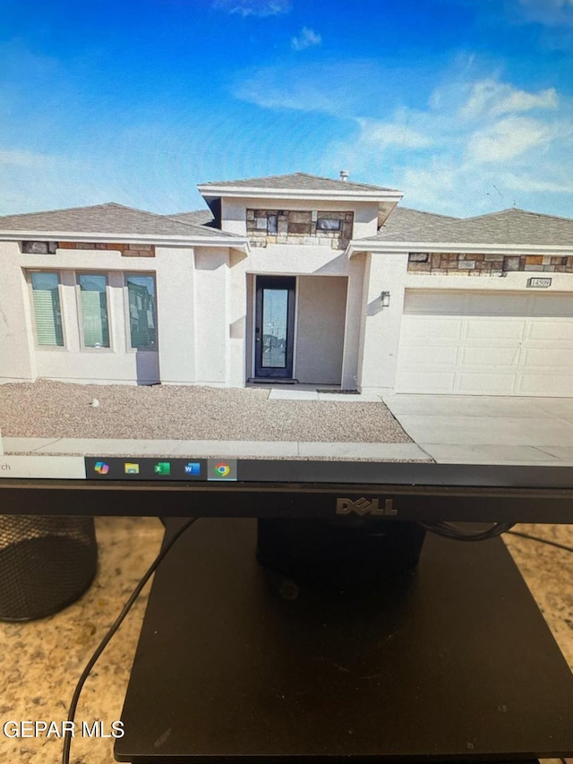 14509 Johnny Mata Dr, El Paso, TX 79938 - prairie-style home with stucco siding and driveway