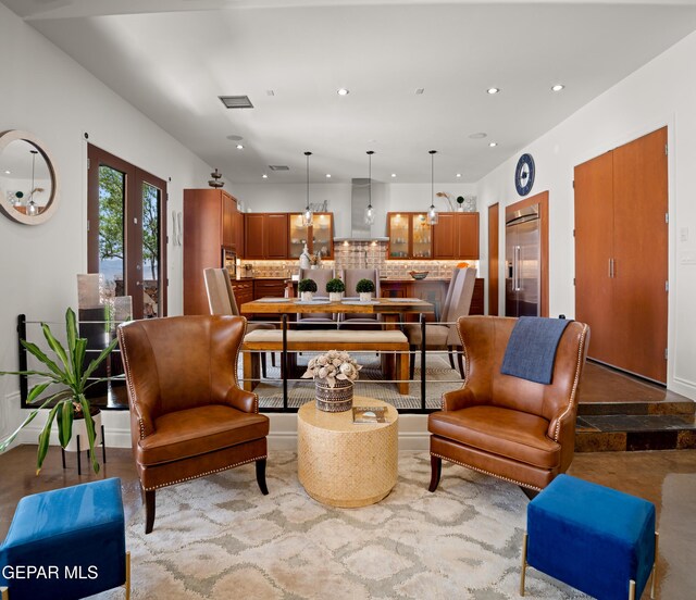 living room featuring french doors, recessed lighting, and visible vents