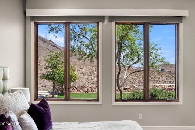 bedroom with a mountain view