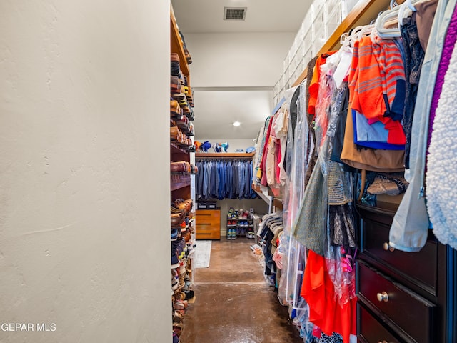 walk in closet with visible vents