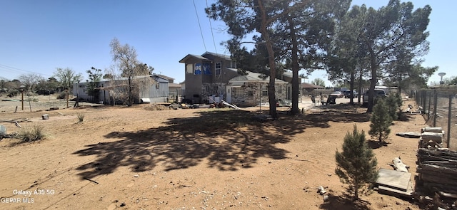 view of yard with fence