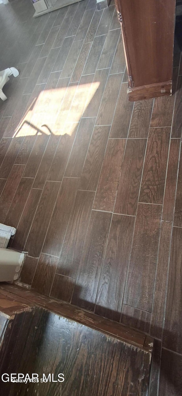 interior details featuring wood finished floors