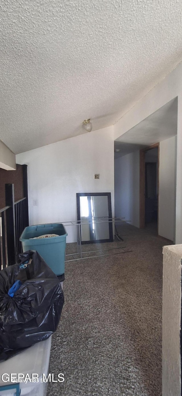 spare room featuring a textured ceiling