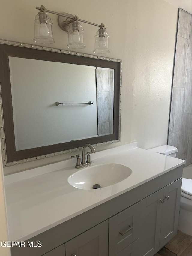 2816 Gaston Dr, El Paso, TX 79935 - bathroom with toilet and vanity