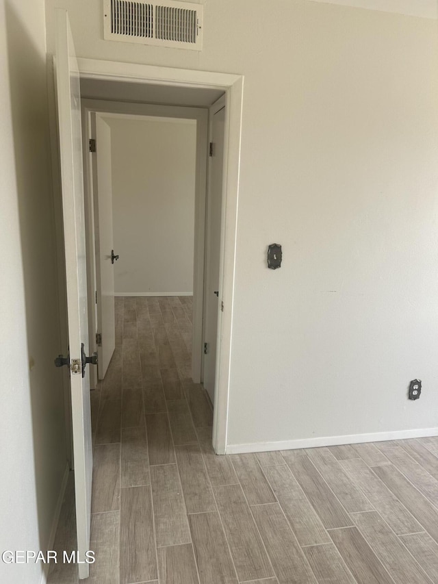 2816 Gaston Dr, El Paso, TX 79935 - hall featuring wood finish floors and baseboards