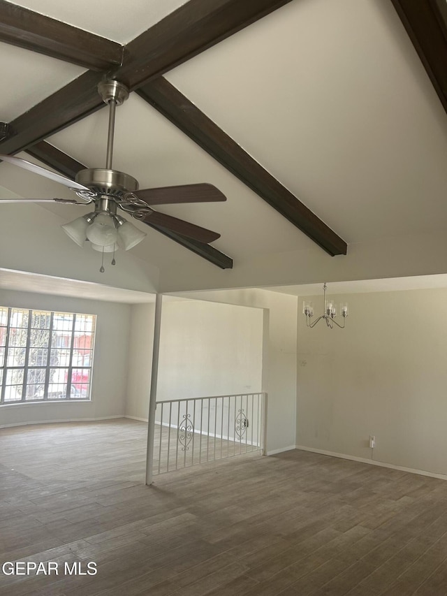 2816 Gaston Dr, El Paso, TX 79935 - spare room featuring a chandelier, ceiling fan, wood finished floors, and baseboards
