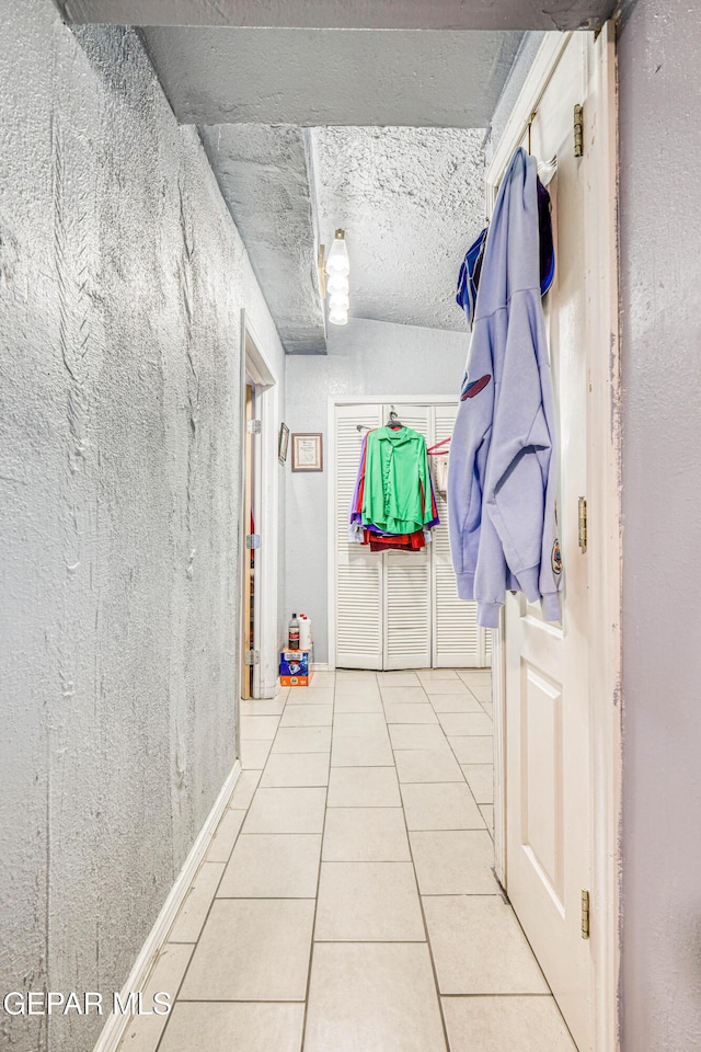 hall featuring tile patterned floors