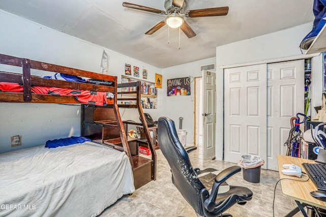 bedroom featuring a closet, a ceiling fan, and visible vents