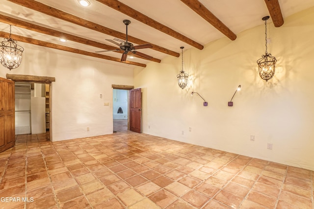 32 Cielo Dorado Dr, Anthony, NM 88021 - spare room featuring ceiling fan with notable chandelier, beam ceiling, and recessed lighting