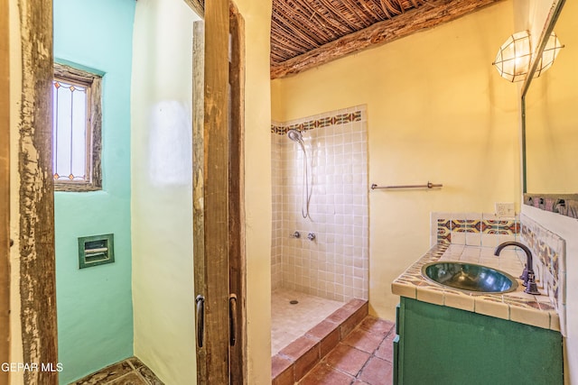 32 Cielo Dorado Dr, Anthony, NM 88021 - bathroom featuring a shower stall, tile patterned floors, and vanity