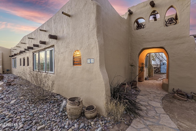 32 Cielo Dorado Dr, Anthony, NM 88021 - view of property exterior at dusk