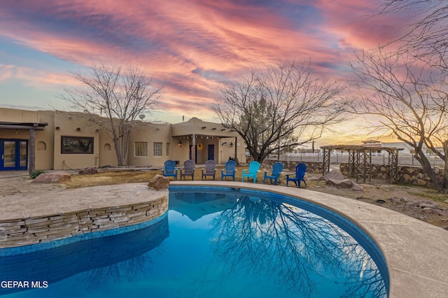 32 Cielo Dorado Dr, Anthony, NM 88021 - view of pool with a pergola, a patio area, and a fenced in pool