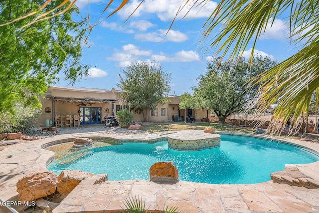 32 Cielo Dorado Dr, Anthony, NM 88021 - outdoor pool with a patio area and ceiling fan
