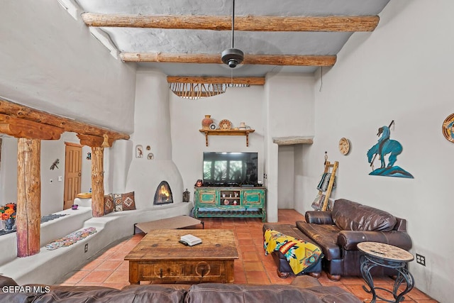 32 Cielo Dorado Dr, Anthony, NM 88021 - tiled living area with a high ceiling and beamed ceiling
