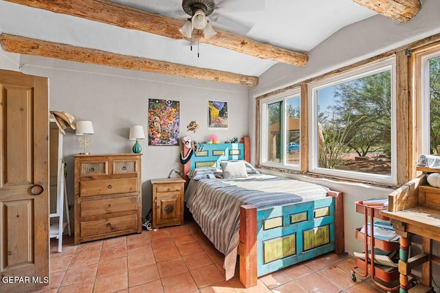 32 Cielo Dorado Dr, Anthony, NM 88021 - bedroom with vaulted ceiling with beams, multiple windows, and light tile patterned floors