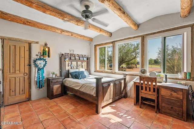 32 Cielo Dorado Dr, Anthony, NM 88021 - bedroom featuring light tile patterned floors and lofted ceiling with beams