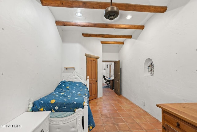 32 Cielo Dorado Dr, Anthony, NM 88021 - bedroom featuring beamed ceiling and light tile patterned flooring