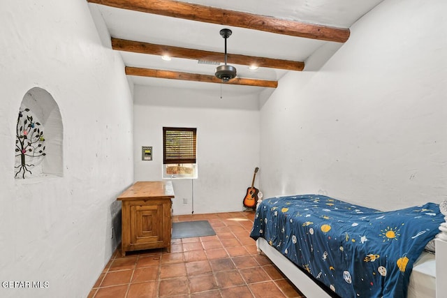 32 Cielo Dorado Dr, Anthony, NM 88021 - bedroom featuring tile patterned flooring and beam ceiling