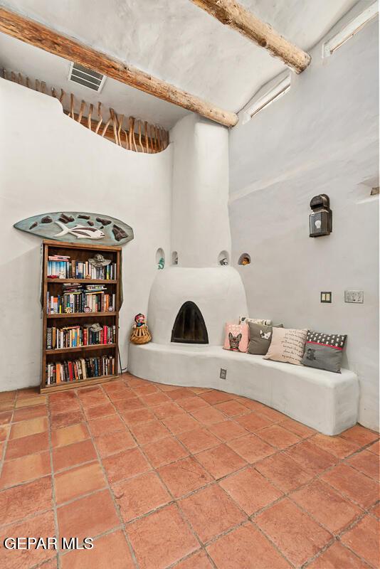 32 Cielo Dorado Dr, Anthony, NM 88021 - interior space with visible vents and a high ceiling