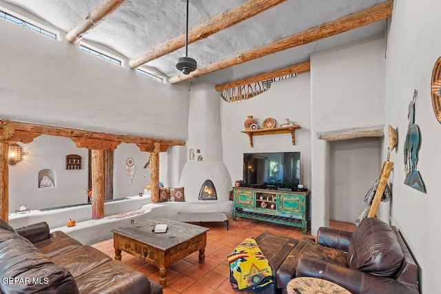 32 Cielo Dorado Dr, Anthony, NM 88021 - living room with tile patterned flooring and a towering ceiling