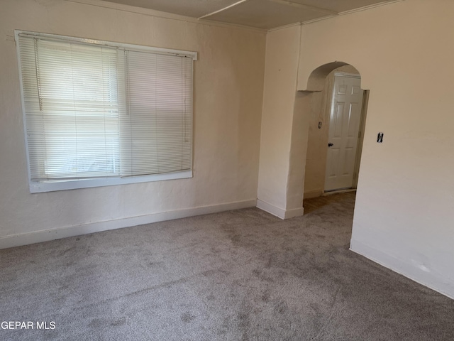 222 Lone Star Pl, El Paso, TX 79907 - carpeted spare room featuring arched walkways and baseboards