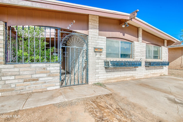 entrance to property featuring a gate