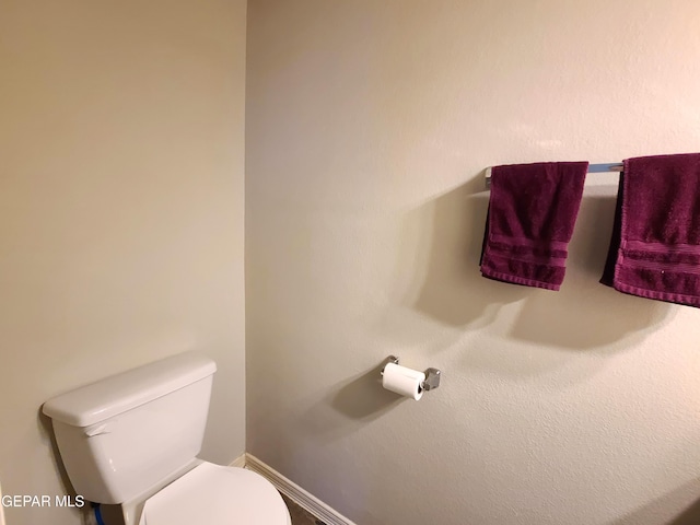 bathroom featuring toilet