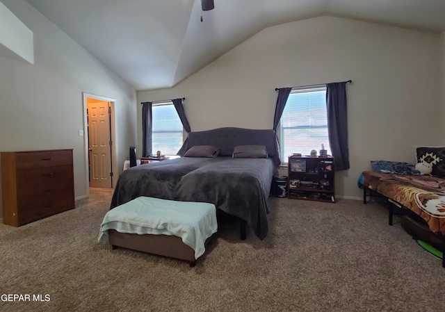 carpeted bedroom featuring ceiling fan and vaulted ceiling