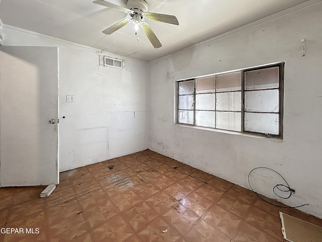 81 N Eucalyptus St, El Paso, TX 79901 - empty room featuring visible vents, a ceiling fan, ornamental molding, and light floors