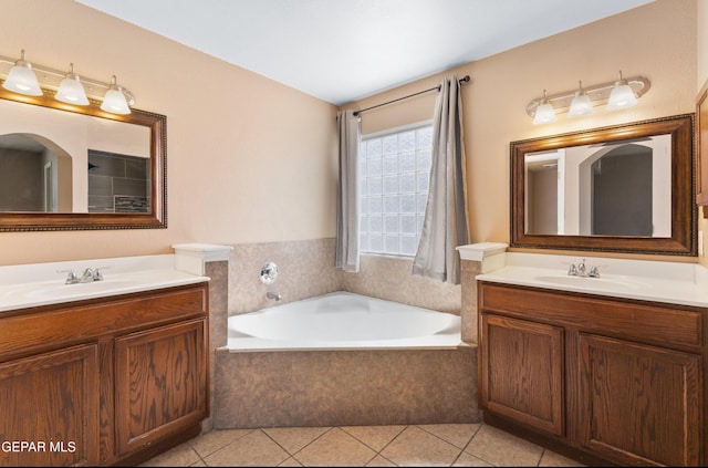12482 Paseo Rojo Dr, El Paso, TX 79928 - bathroom with a sink, tile patterned floors, and two vanities