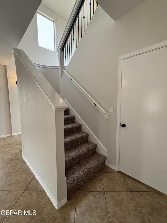 14368 N Cave Dr, El Paso, TX 79938 - stairs with baseboards and tile patterned flooring